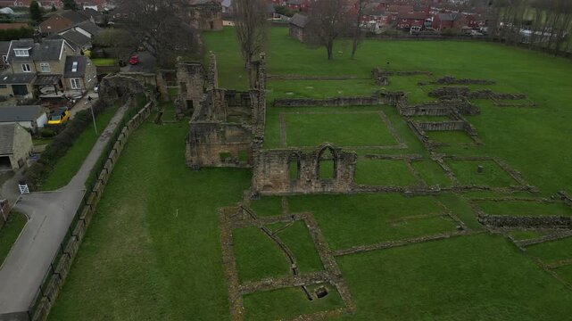 Peaceful Drone View of Ancient Stone Ruins at Monk Bretton Priory, Barnsley UK, 4K