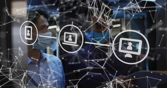 Standing masked pair on subway, left wearing blue shirt, right scrolling phone with network overlay