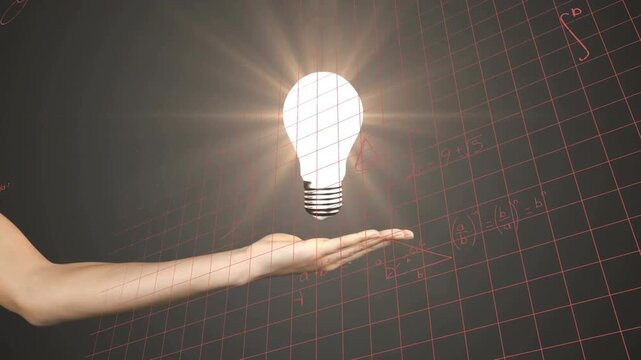 Forearm presenting palm up while descending bulb hovering glowing, visualizing math on tech grid