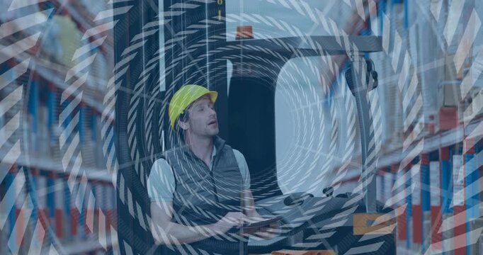 Vertical video: Warehouse picker tapping tablet causing spiral pointing to shelf checking stock