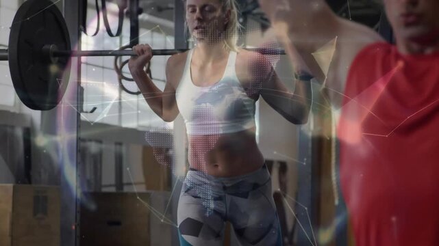 Vertical video: Unracking bar, woman doing back squats at gym training in sports bra and leggings