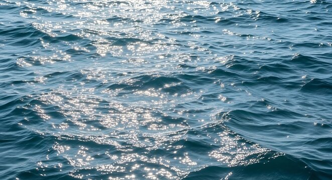 Sparkling Ocean Water Surface with Sunlight Reflections.