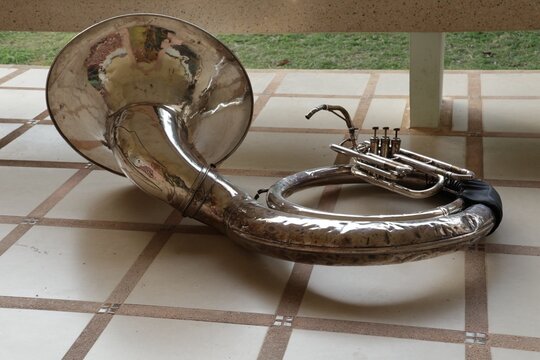 The sousaphone is a brass wind instrument used in marching bands, named after John Philip Sousa.