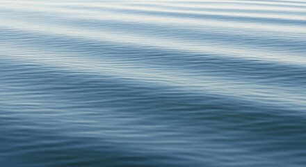 Abstract Rippling Blue Water Surface with Gentle Waves and Light Reflections.