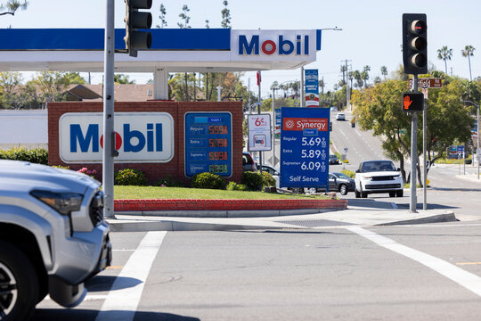 Yorba Linda, California, USA - March 12, 2026: A Mobil gas station displays gas prices.