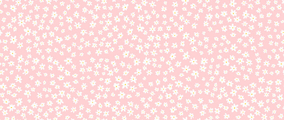 Small white flower seamless pattern on pink background. Cute hand drawn ditzy floral repeated wallpaper. Vector romantic blossom motif for textile print, fabric swatch, dress ornament, wrapping paper