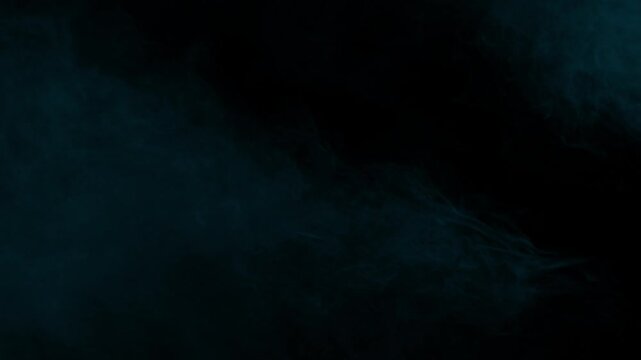 Extremely dark background with barely perceptible wisps of cyan fog for maximum subtlety