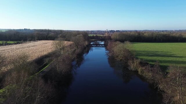 Aerial Drone View of L'Orne River Flowing Past Caen and Louvigny on Beautiful Sunny Day in Normandy France