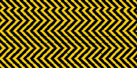 A striking black and yellow chevron pattern fills the entire frame © Piku