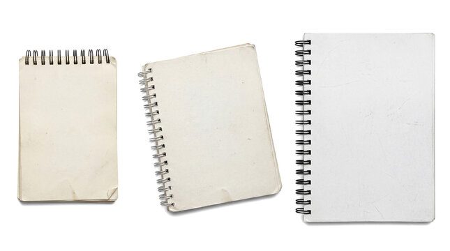 set of three vintage spiral-bound notepads, two with blank off-white pages and one with ruled paper, isolated on transparent background, viewed from the front.