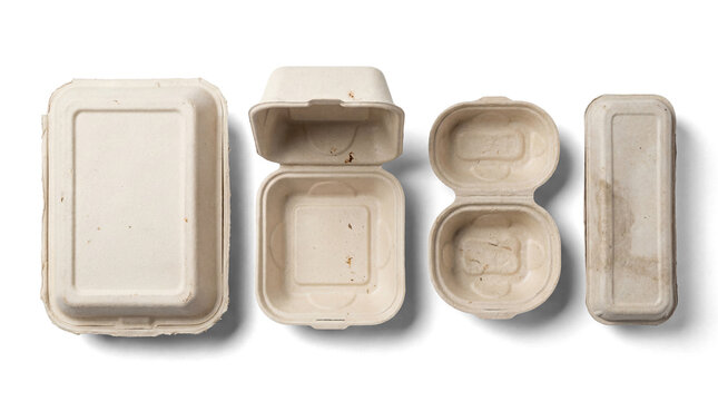 Overhead photograph of four eco-friendly biodegradable food containers for sustainable takeaway.
