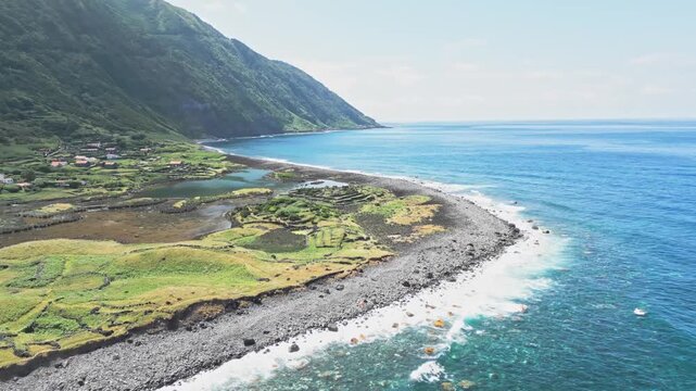 Scenic view of Sao Jorge coastline and vibrant ocean in the Azores