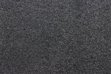 Fototapeta premium Dark, textured carpet fills the entire frame