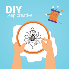 Vector illustration of hands embroidering floral design with hoop and thread © Putul RGB