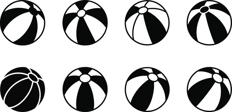 Various black and white beach balls in different designs and patterns