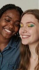 Multiethnic female friends laughing together for inclusive beauty and diversity marketing campaign