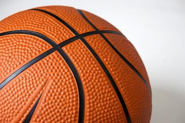 Fototapeta premium Orange basketball with black stitched lines
