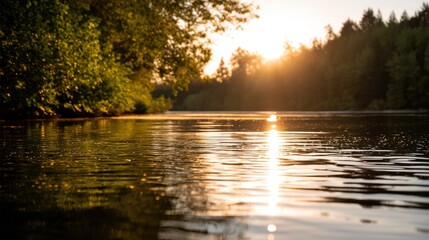 Obraz premium Serene River at Sunset with Reflections of Trees and Golden Light in Calm Waters