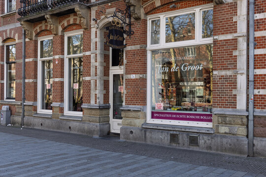 Traditional Dutch bakery storefront Jan de Groot in Den Bosch famous for Bossche Bollen pastry, historic brick building and local food shop.  's-Hertogenbosch., Netherlands, 1 march 2026.