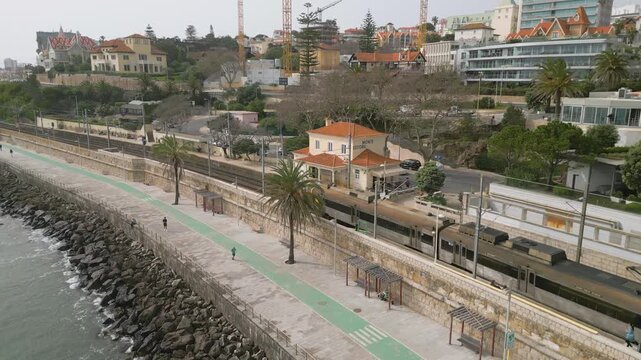 Aerial Tracking of Train in Monte Estoril Station , Portugal