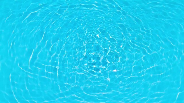Ripples on turquoise water surface blue waves liquid pool ocean