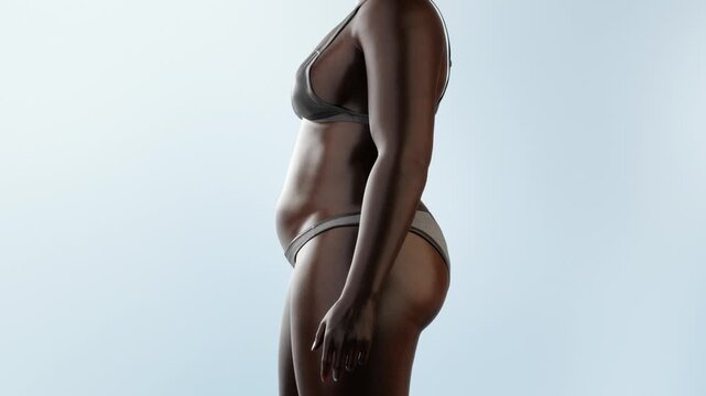 Black woman burn belly fat, lose weight,  fitness and body shaping by fat cell burning, close-up of waistline reduction, obese people become slimmer and healthy, body management, 3D. Alpha channel.