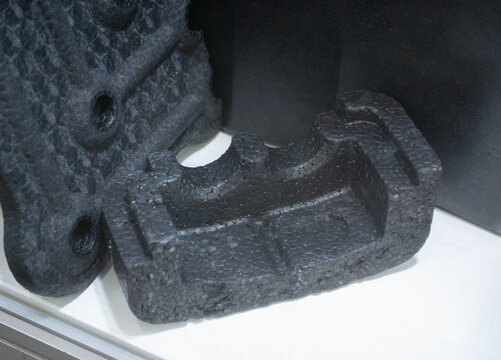 Products made from foamed polymers expanded polypropylene EPP and expanded polystyrene EPS. Model of dense and lightweight material, universal foam. New modern technologies. Industrial manufacturing