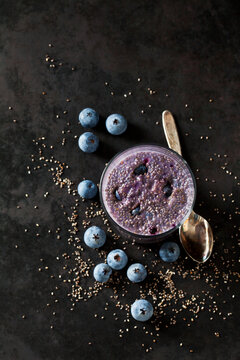Dessert of chia seeds, cacao nibs and blueberries