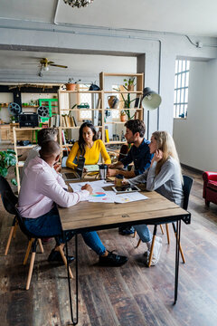 Business team having a meeting in loft office