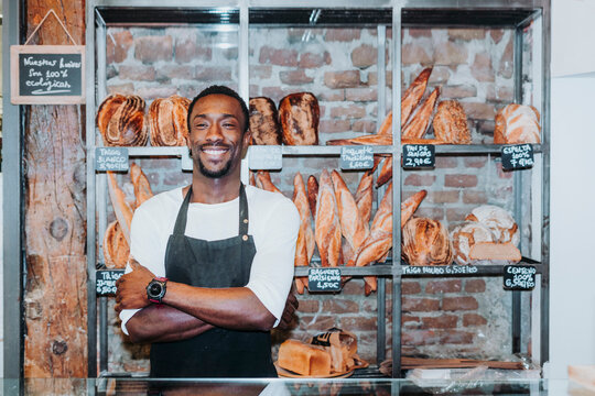 Smiling man working in a bakery