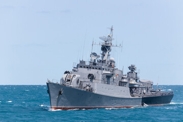 Naklejka premium Navy frigate sail on the smooth sea during mission of protect and rescue in sea.