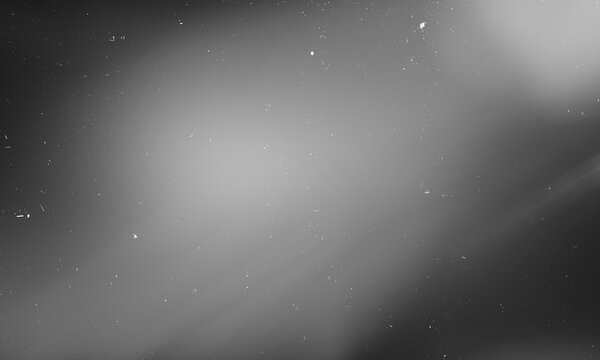 Vintage Black And White Film Grain Texture With Dust Scratches And Light Leak Background