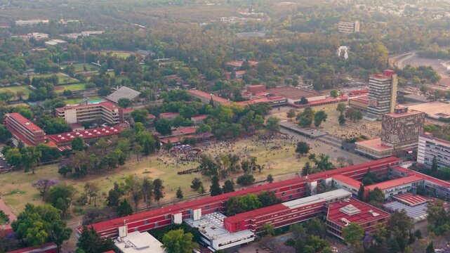 Drone panorama of academic buildings and people on campus