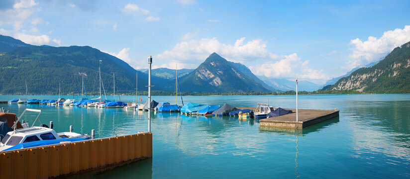 harbor Darligen, lake Thunersee. view to Harder Kulm mountain, switzerland