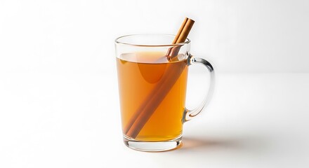 A glass mug of warm apple cider with a cinnamon stick