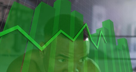 Leaning adult male studying translucent green 3D bars and jagged line at office, wearing tank top © vectorfusionart