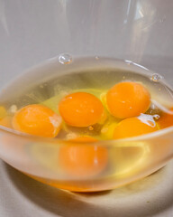 Fresh Eggs in Glass Bowl on Kitchen Countertop