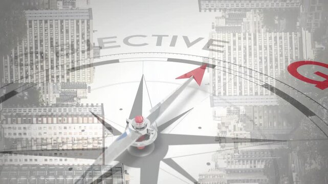 On play metallic compass rotating in business, red-tipped needle aligning OBJECTIVE toward GOAL