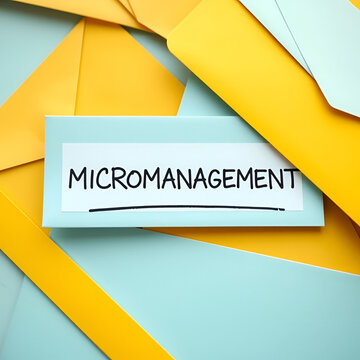 Office envelopes with text written note MICROMANAGEMENT refer to management style which boss manager gives excessive supervision to employees, control every part of project