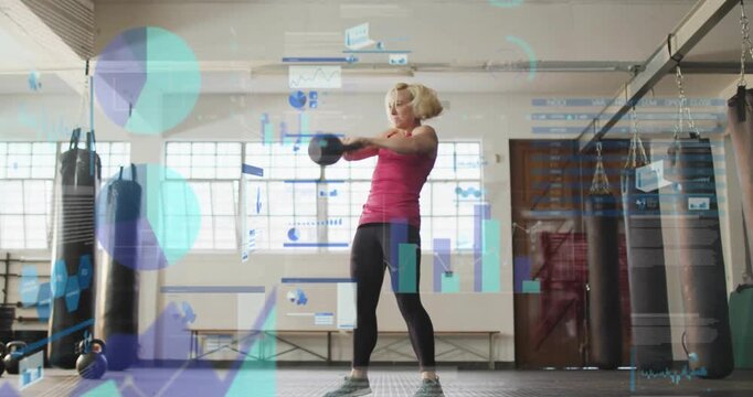 Woman doing KB swings in gym hinging hips and driving while HUD charts overlaying fitness data