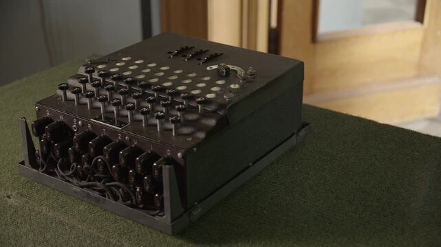 Enigma cipher device. Retro machine device attached to a typewriter