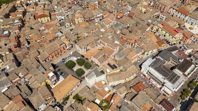 Aerial view on houses, buildings and apartments in the historic center of Venosa, a small town in province of Potenza, Basilicata, Italy. It is a sunny summer morning.
