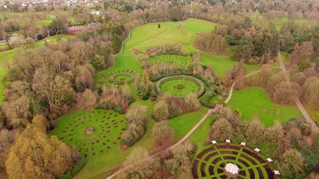 Advancing 4K 60FPS aerial video of Sir Thomas and Lady Dixon Park in Belfast, Northern Ireland on a sunny day. Produced with Rec709 color.
