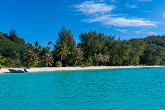 White sand beach with turquoise water in Aukena, Gambier Islands