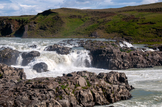View of Pjorsa river flowing over rock formations