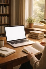 Fototapeta premium Cozy workspace with books, laptop.