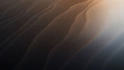 Abstract Sand Dune Waves under a Warm Golden Light at Dusk