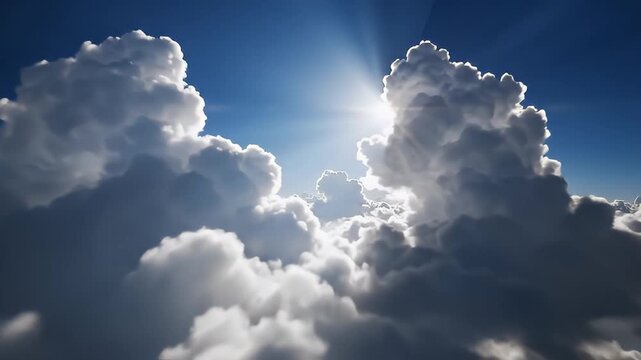 A serene video of sunbeams shining through clouds in a blue sky