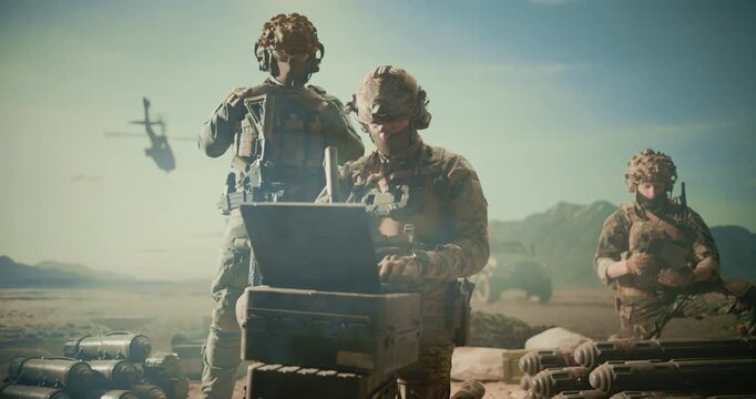 Special Forces Soldiers Deploy Reconnaissance and Surveillance Systems at a Desert Base, Operating Field Laptop, Providing Tracking and Air Strike Analysis for Helicopter Battlefield Coordination