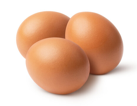 Three chicken eggs isolated on white background